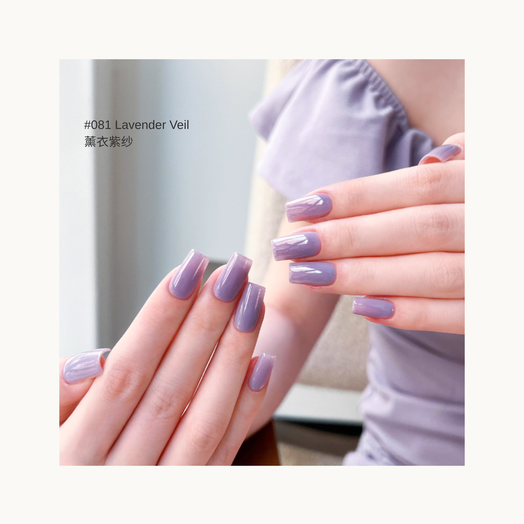 Close-up of long square gel nails in a soft lavender shade with a high-shine, translucent gel finish.