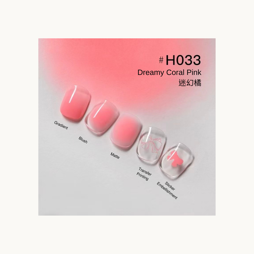 Coral pink press-on nails featuring gradient, blush, matte finish, and ribbon sticker embellishments.