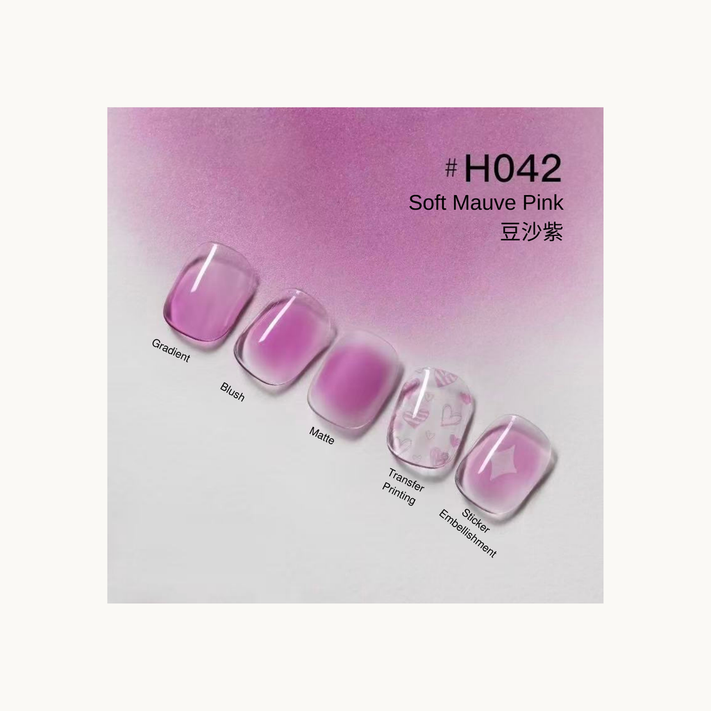 Taye Nformula Life soft mauve pink press-on nails featuring gradient, blush, matte texture, and heart-pattern transfer printing.