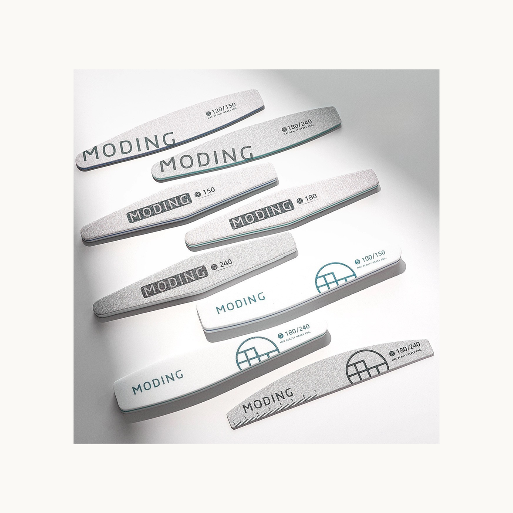 MODING professional nail file collection including zebra files, sponge buffers, and multiple grit options for salon use