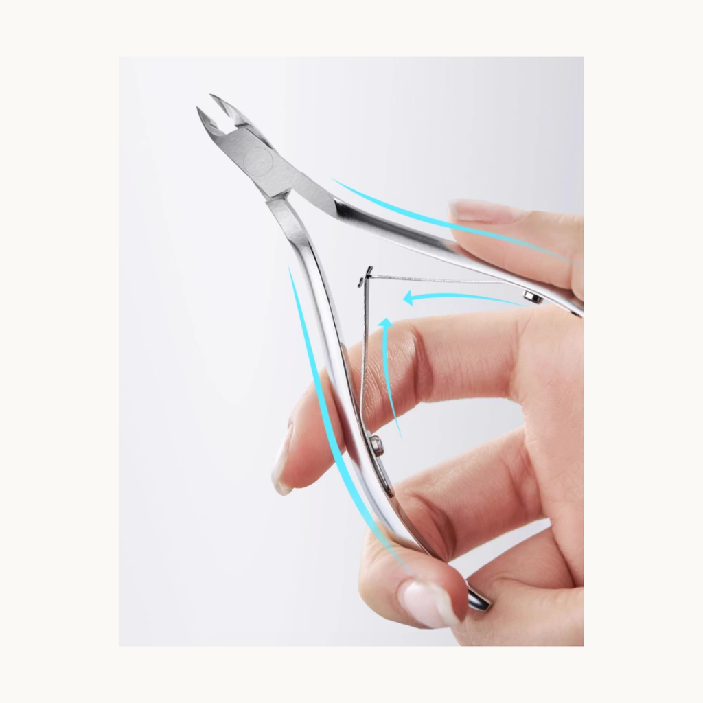 MODING cuticle nipper shown in hand demonstrating ergonomic grip and smooth cutting motion