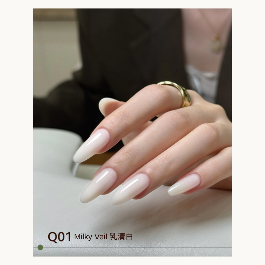 Soft milky-white sheer nude nails in almond shape using MODING shade Q01 Milky Veil.