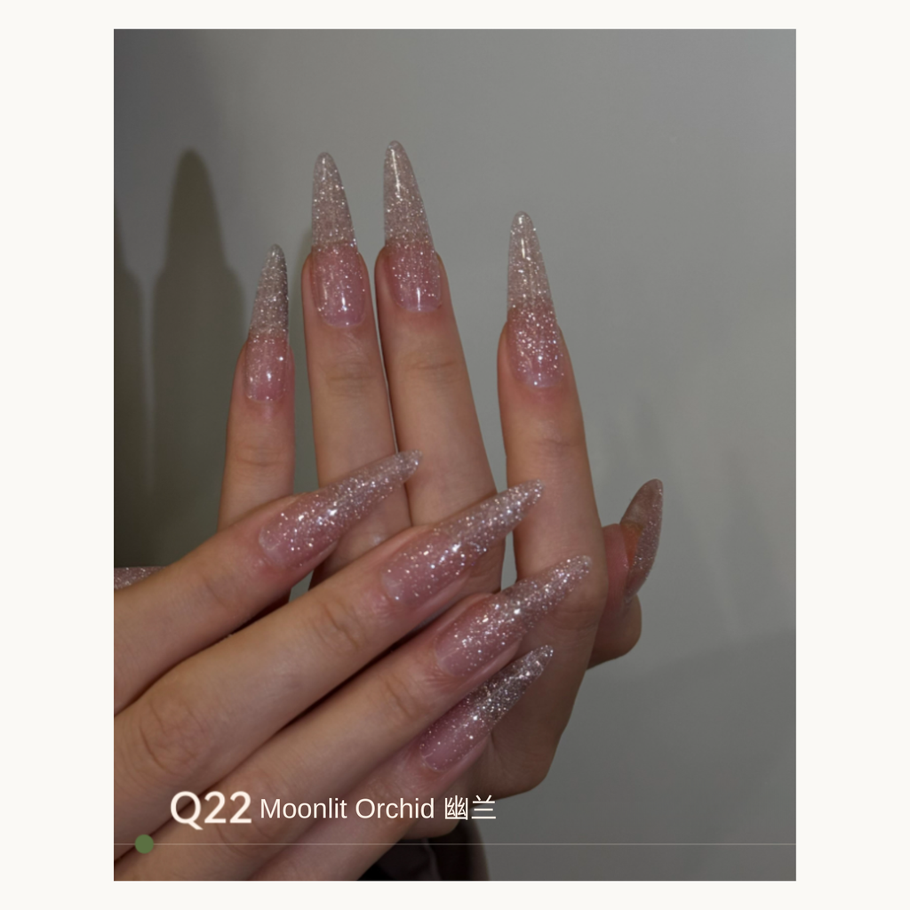 Soft orchid-pink glitter gradient nails using MODING Q22 Orchid Mist.