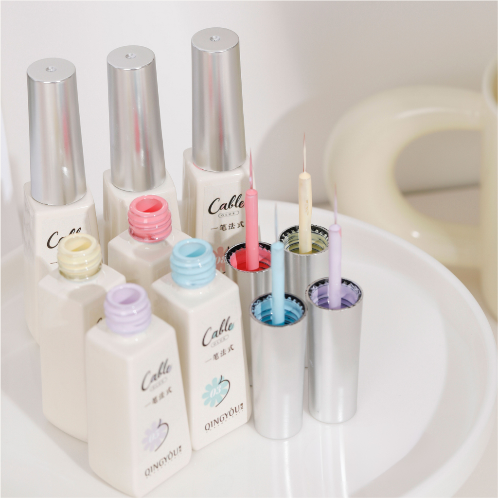 Main display of QINGYOU 12-color One Stroke French Gel set with fine-tip brushes for easy french application.