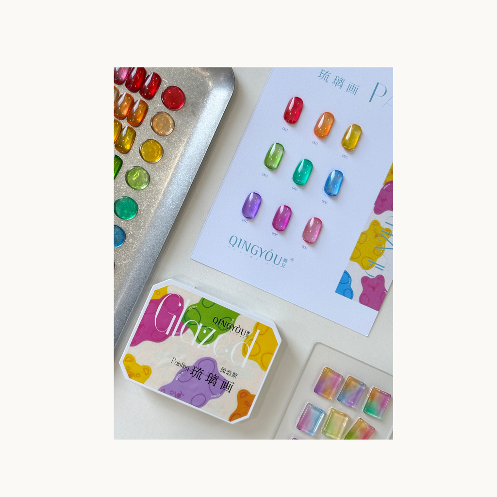 Close-up display of Qingyou Glazed Painting Gel color swatches on sample board