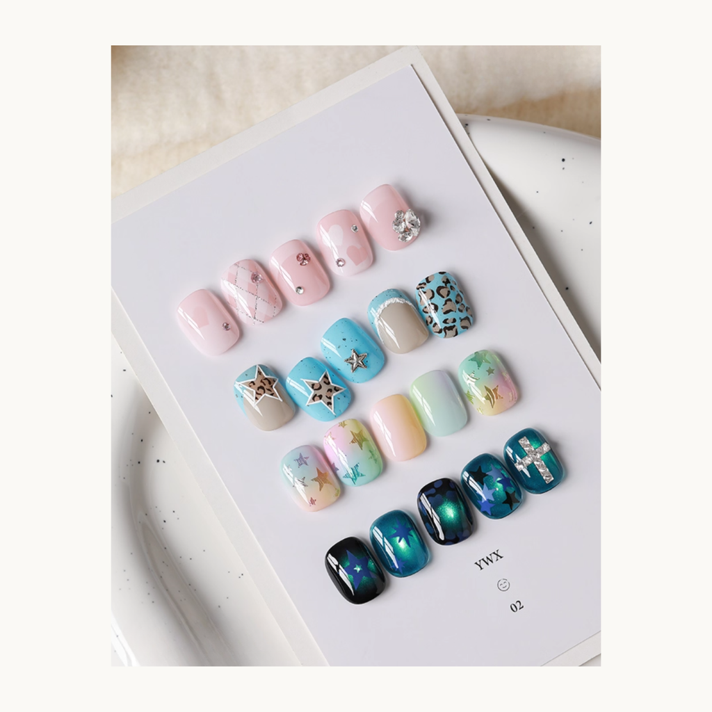 Finished nail art samples created using TAYE star cutout nail stencils, showcasing multiple colors and effects.