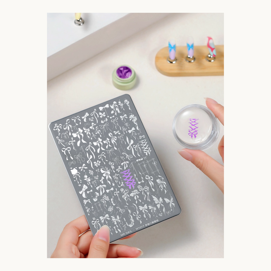 MR NAIL bow stamping plate used with capsule silicone stamper to transfer purple pattern
