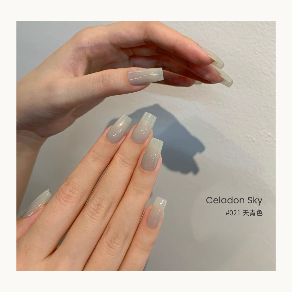 0-additive formula MODING “WÚ 無” Cold Wood Spring Bloom Collection Bottle Gel #021 Celadon Sky 天青色, sheer cool sky-blue gel perfect for soft serenity-inspired manicures.