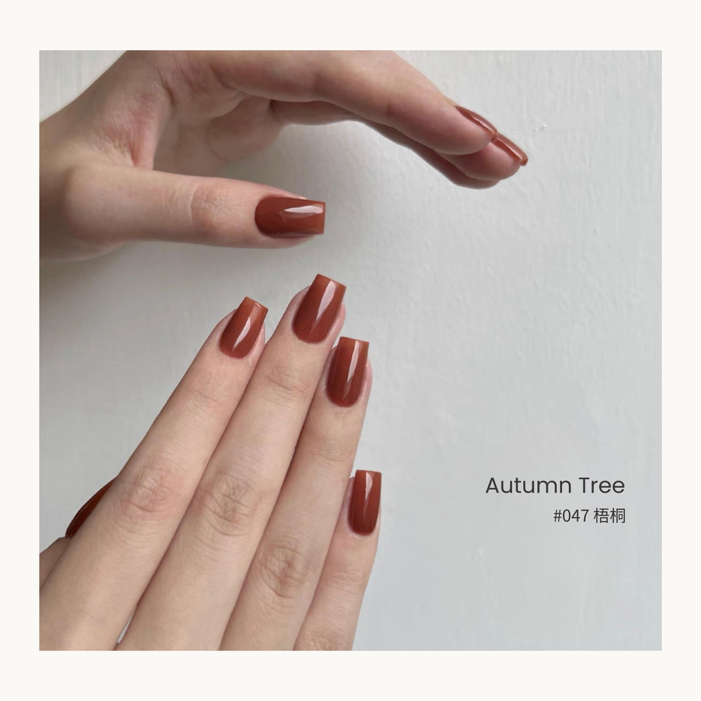 0-additive formula MODING “WÚ 無” Rain-Wet Greenhouse Collection Bottle Gel #047 Autumn Tree 梧桐, soft brown-orange tone with translucent glaze texture.