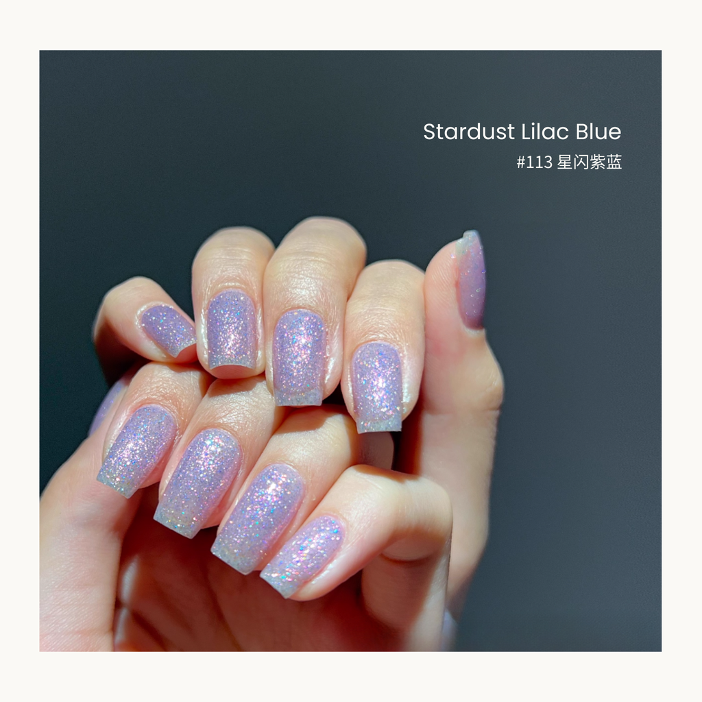 MODING #113 Stardust Lilac Blue gel polish with shimmering purple-blue cat-eye sparkle.