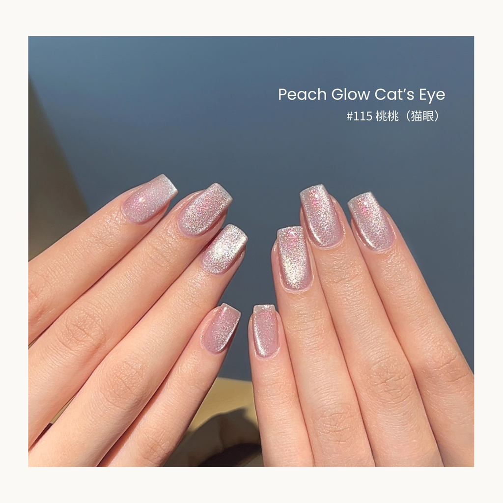 MODING #115 Cat’s Eye Peach Glow gel polish in a soft pink-peach shimmer cat-eye style.
