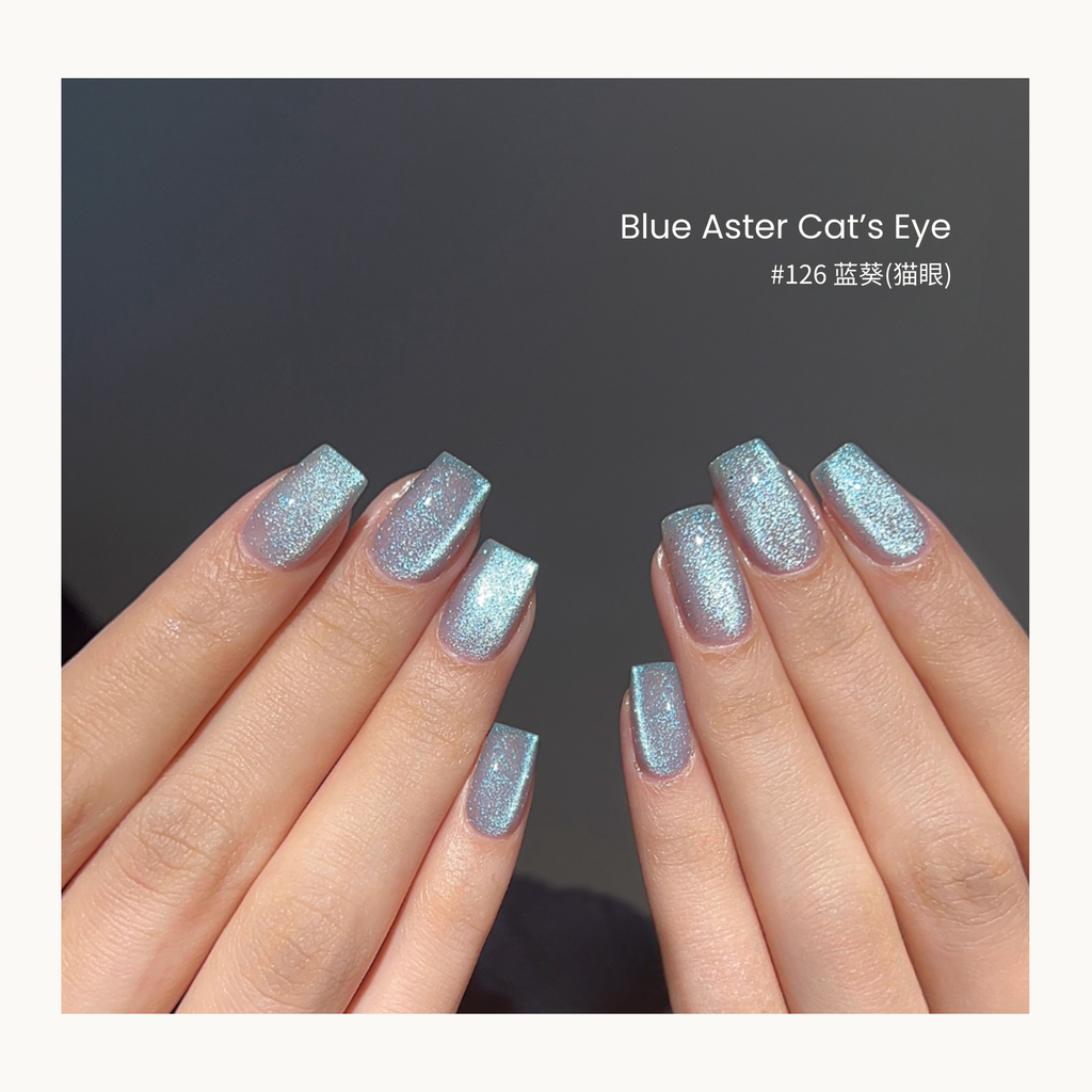 MODING #126 Cat’s Eye Blue Aster gel polish with shimmering blue-silver cat-eye effect.
