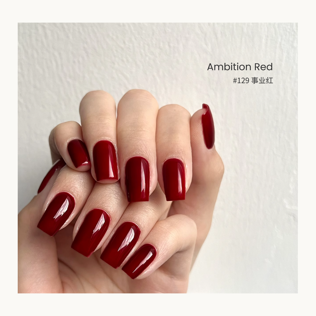MODING #129 Ambition Red gel polish in a deep professional burgundy-red tone.