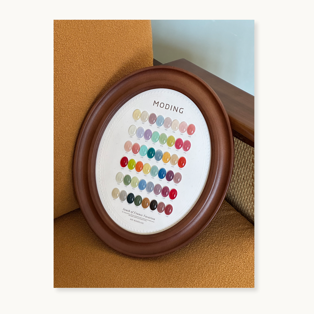 Studio display of the hema-free, tpo-free and tmpta-free  gel brand Moding French Collection nail gel color samples, highlighting elegant pastel tones.
