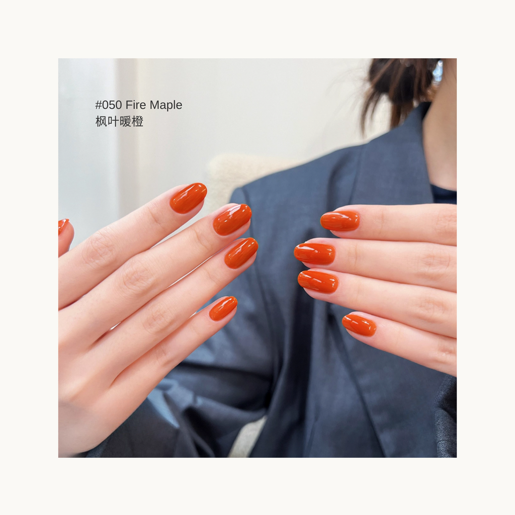 MODING M050 Fire Maple maple orange red nail polish on model hands