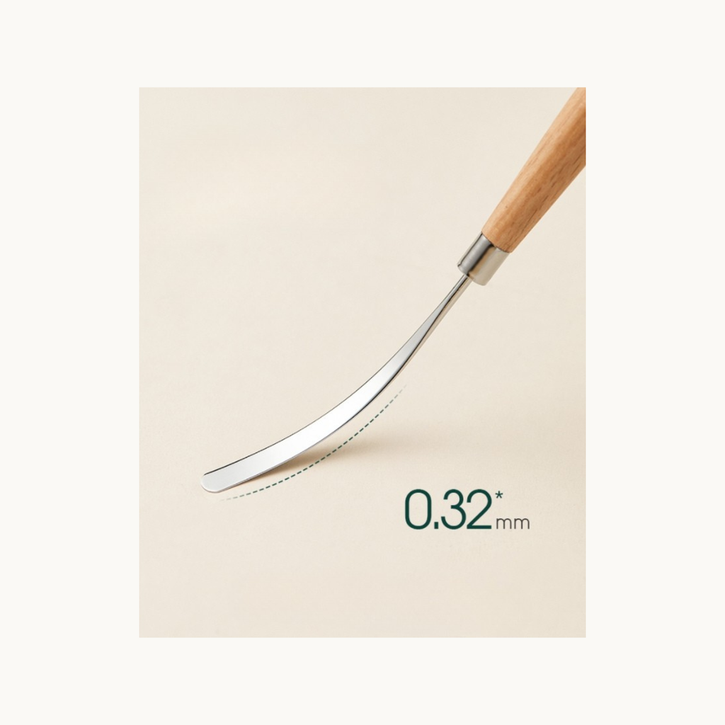 Close-up of MODING flexible nail gel spatula showing 0.32mm thin curved metal blade