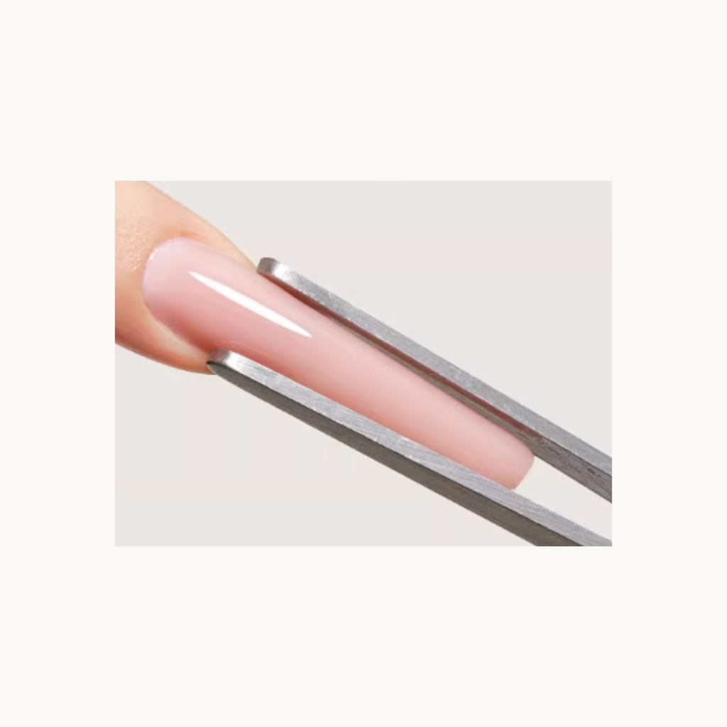 Nail shaping clip demonstrating how to pinch and shape builder gel on an extension nail for a slimmer C-curve