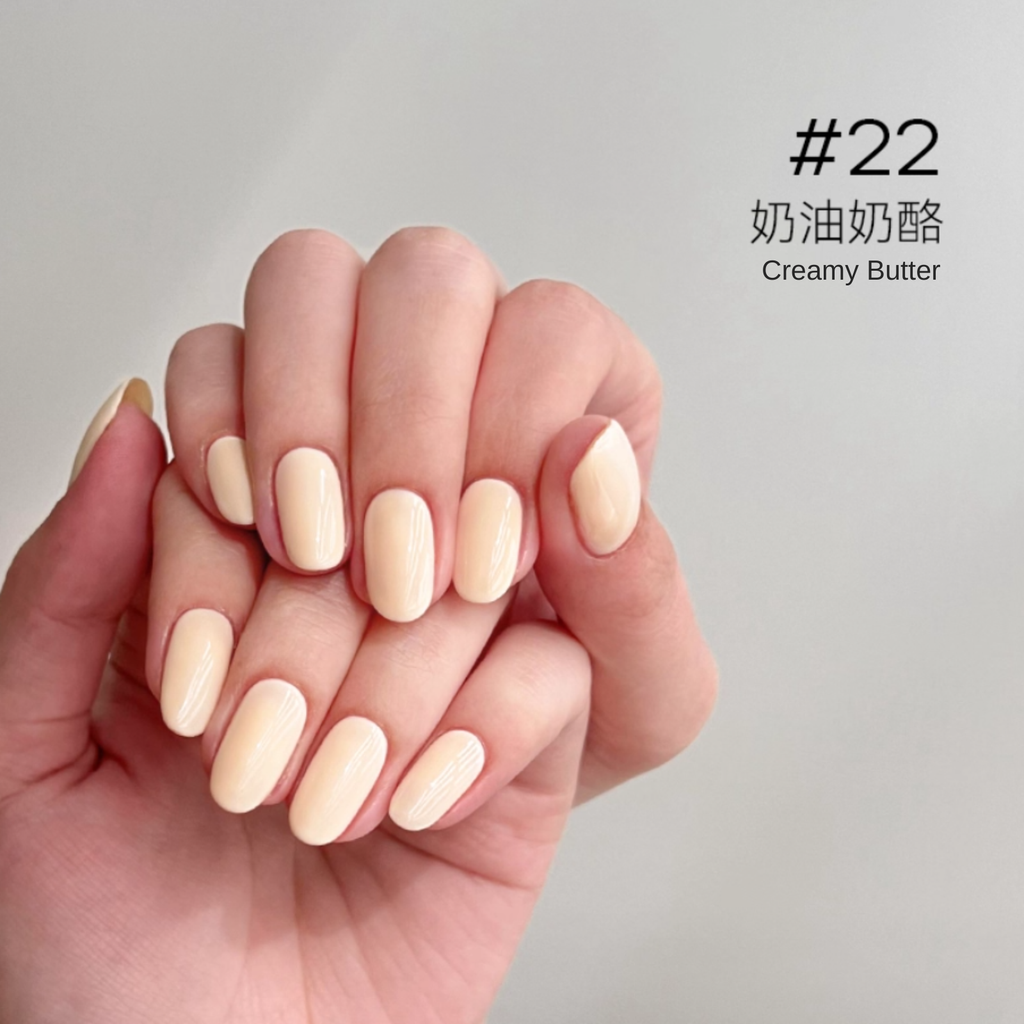 Hand swatch of moding #22 Creamy Butter Nude nail gel showing smooth creamy nude finish