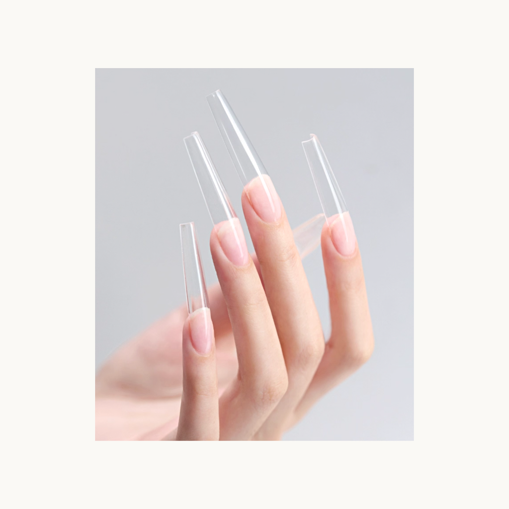 Clear full-cover nail tips applied using MODING nail glue shown on hand