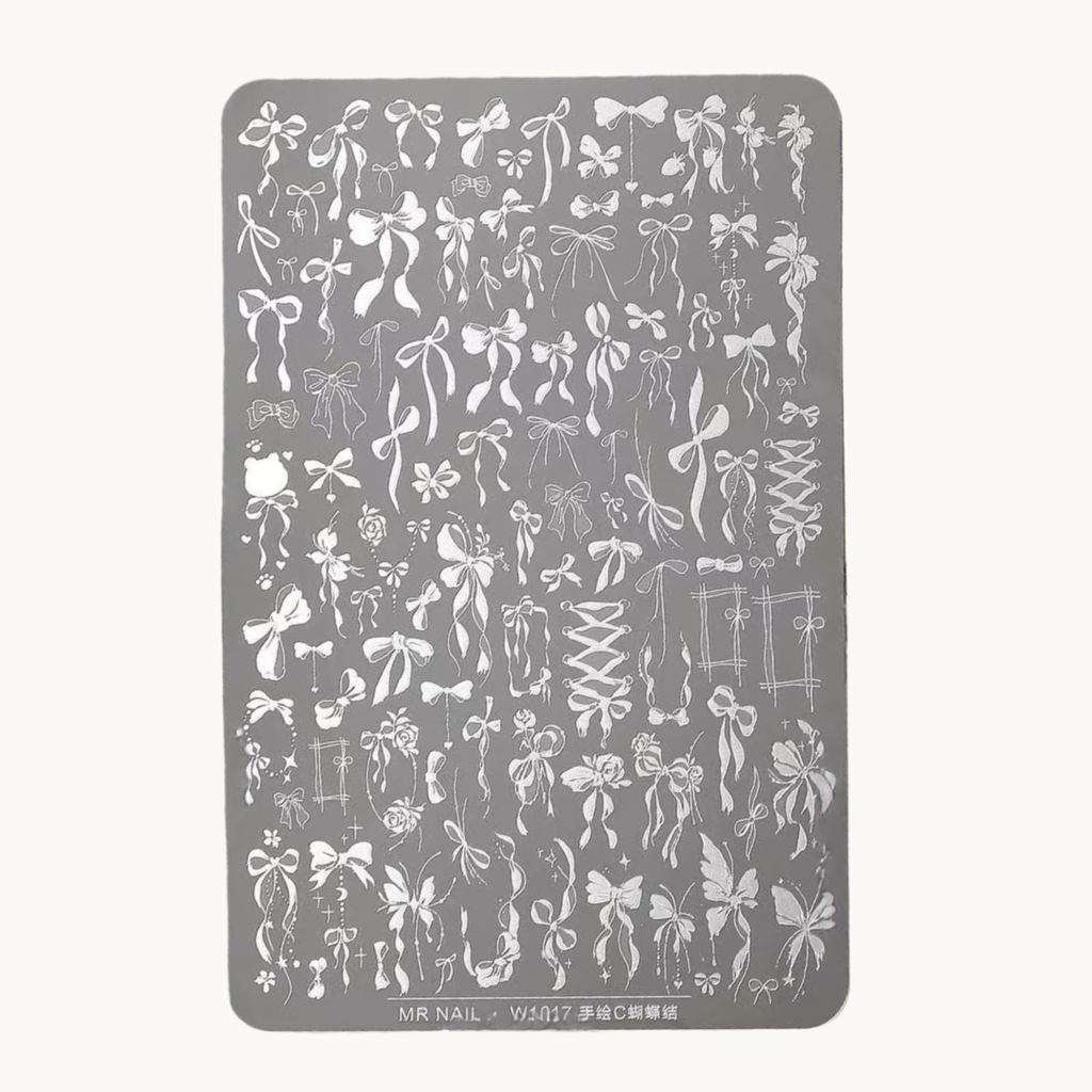 MR NAIL W1017 hand-drawn ribbon stamping plate product photo, detailed bow designs on large nail art steel plate