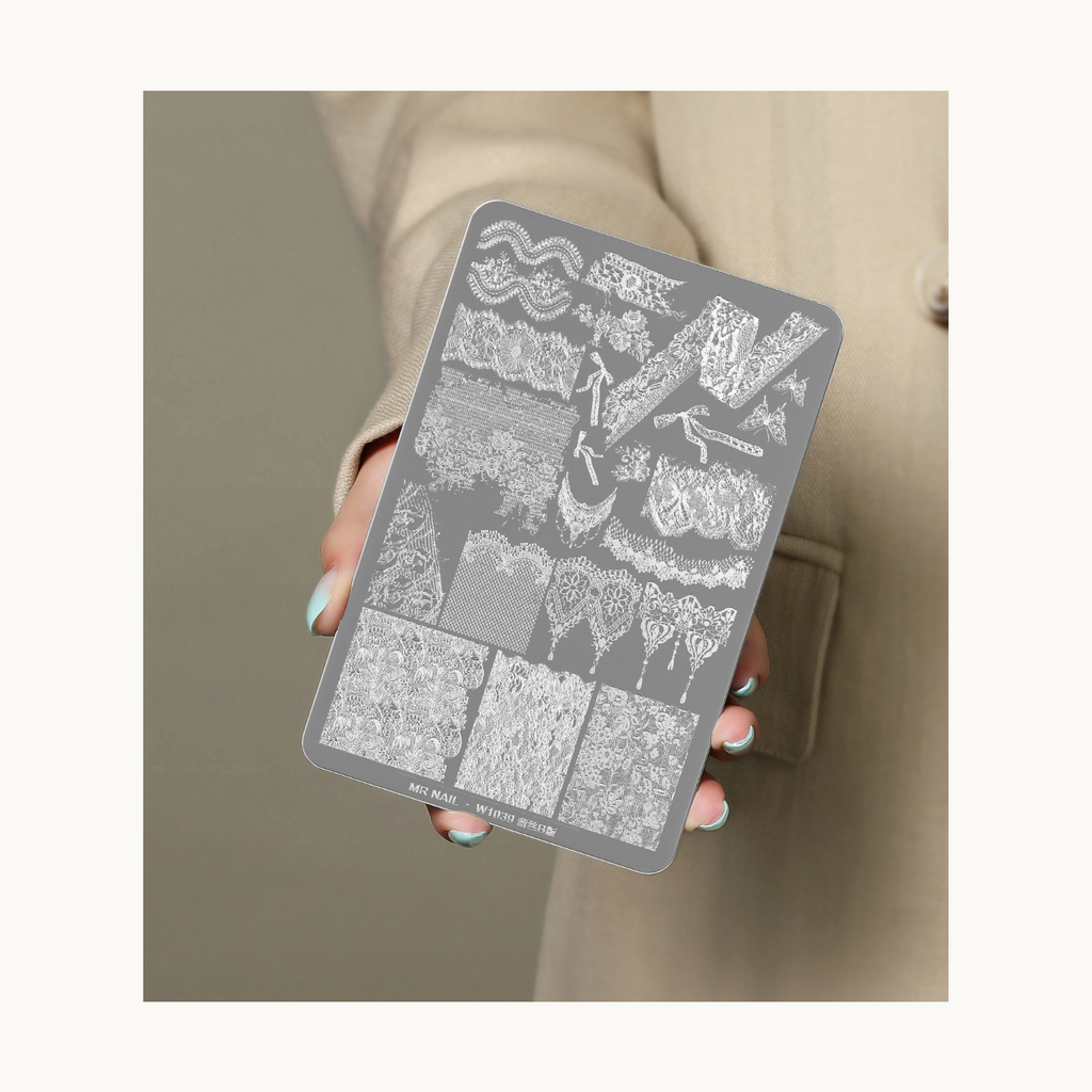 Model holding MR NAIL W1039 lace stamping plate showing detailed lace textures and patterns