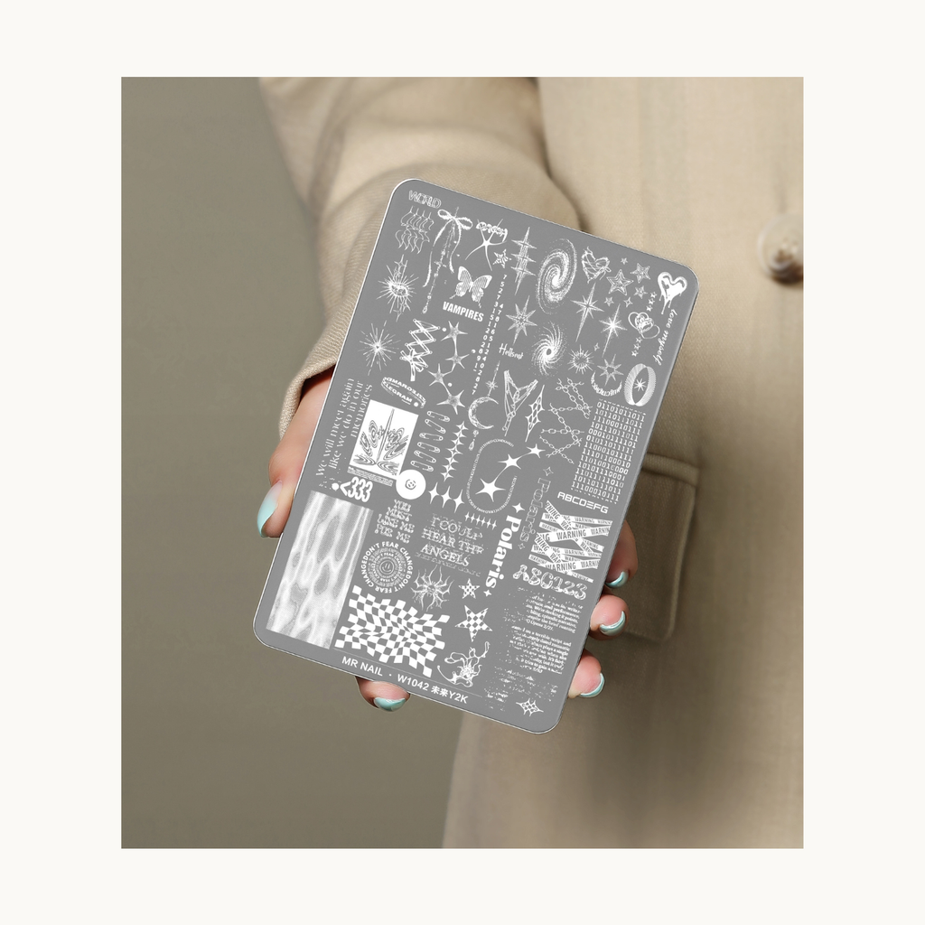 Hand holding MR NAIL W1042 Y2K cyber-style nail stamping plate for size reference