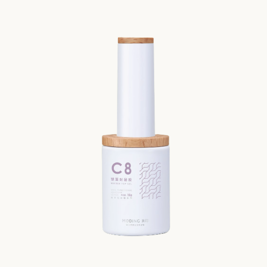 moding c08 chrome mirrror top nail gel bottle with wooden cap on white background