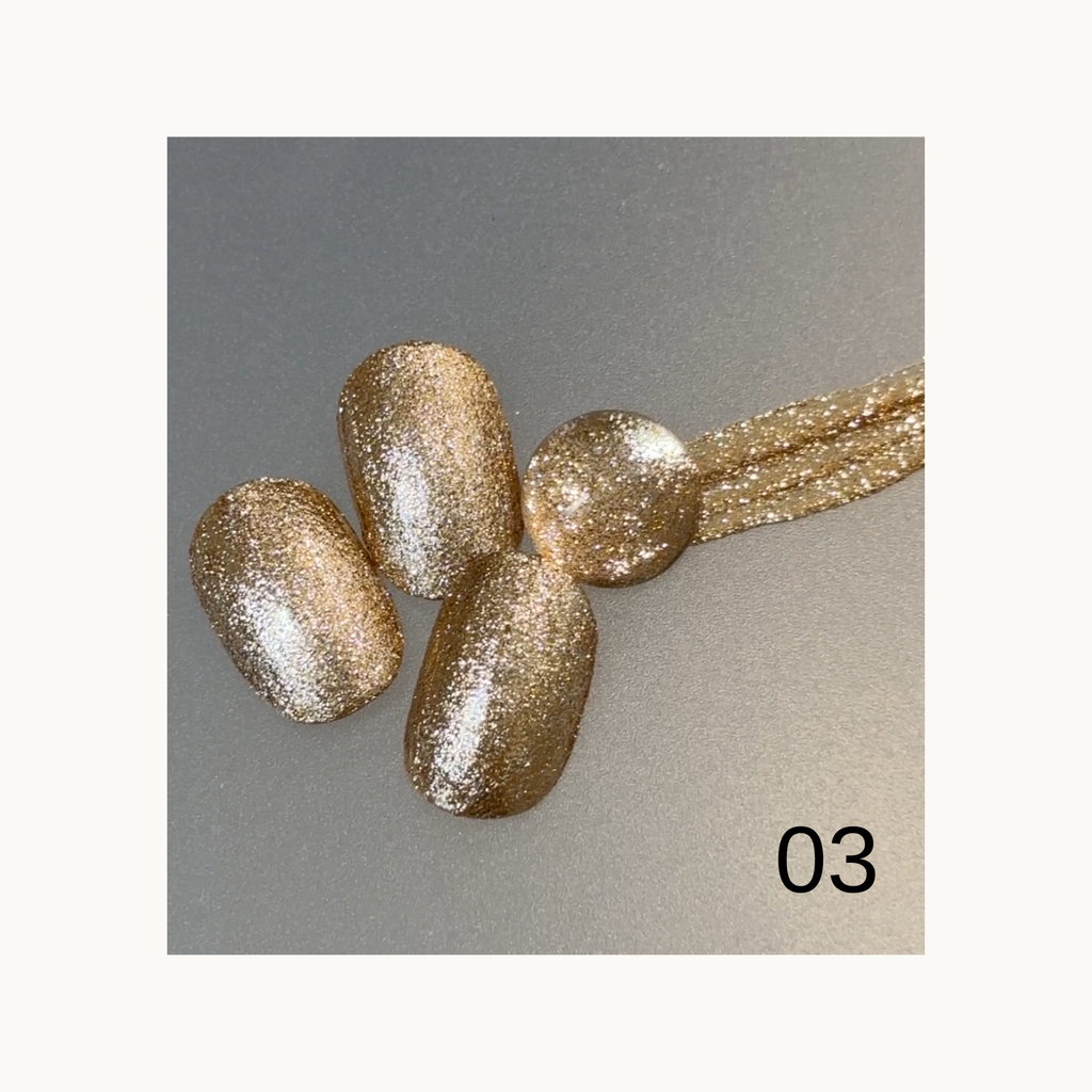 qingyou champagne gold glitter gel nail swatch with soft warm metallic glow