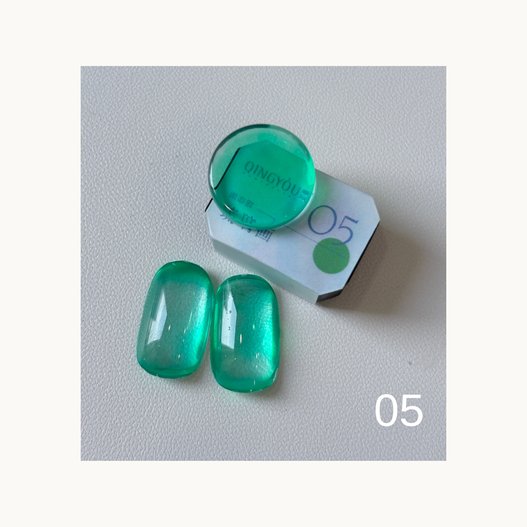 QINGYOU Cube Glass Jelly Painting Gel 05 Teal translucent glass-effect color swatch with cube and nail tips