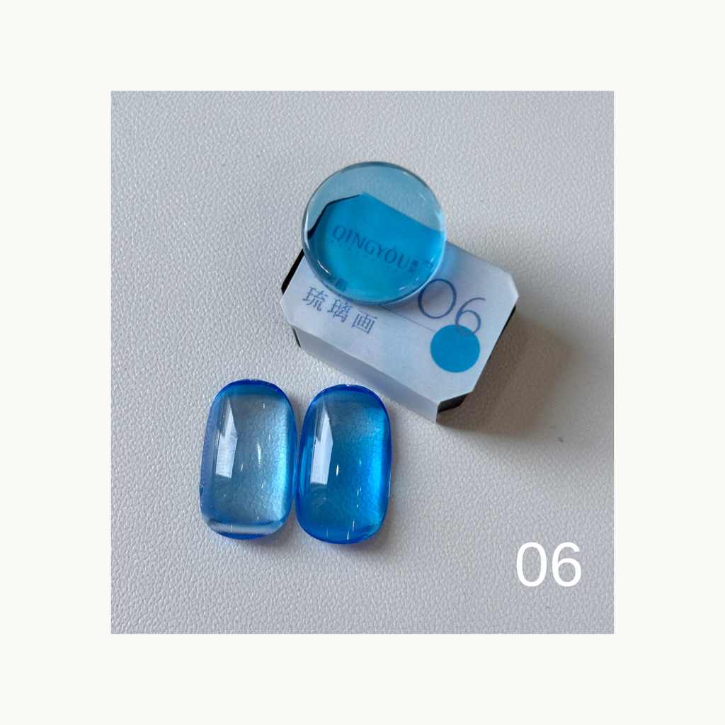 QINGYOU Cube Glass Jelly Painting Gel 06 Blue translucent glass-effect color swatch with cube and nail tips