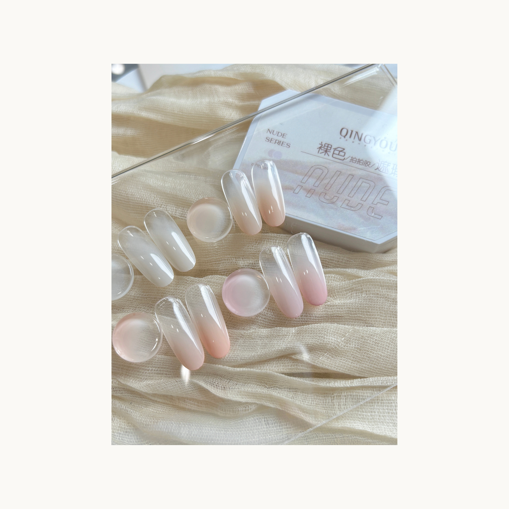 Open view of the QINGYOU nude 4-grid gel palette showing creamy nude textures and swatches