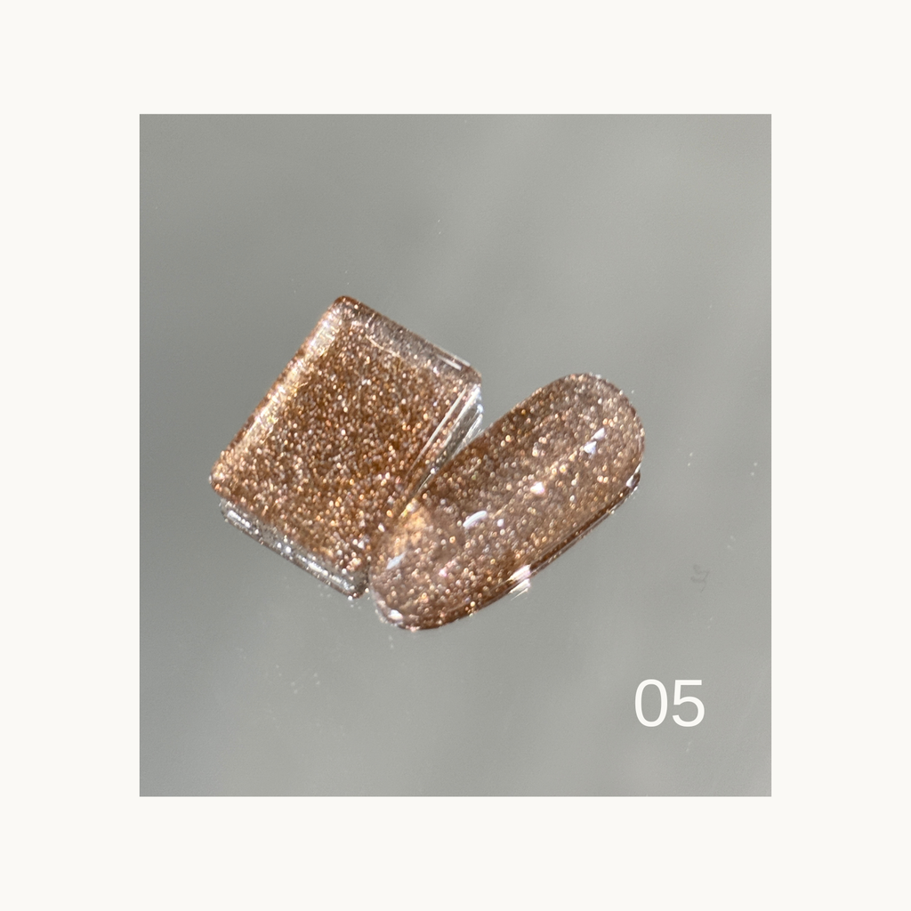 Qingyou Rainbow Glitter 05 warm bronze glitter gel swatch with fine shimmer