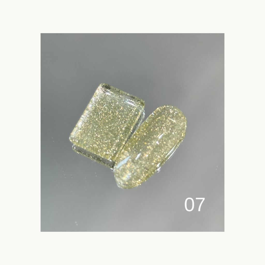 Qingyou Rainbow Glitter 07 light gold glitter gel showing bright reflective shine