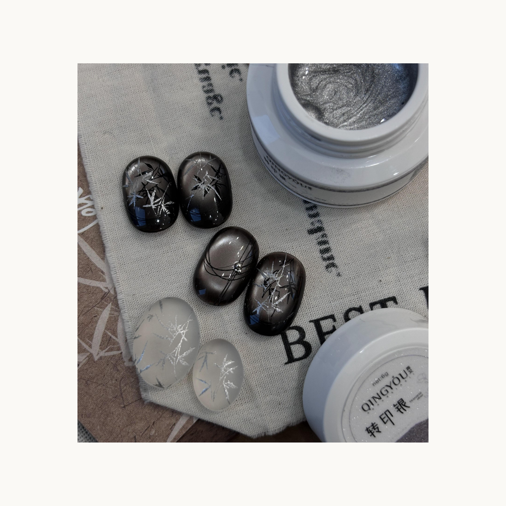 QingYou silver transfer gel applied with floral stamping plate for crisp metallic designs.