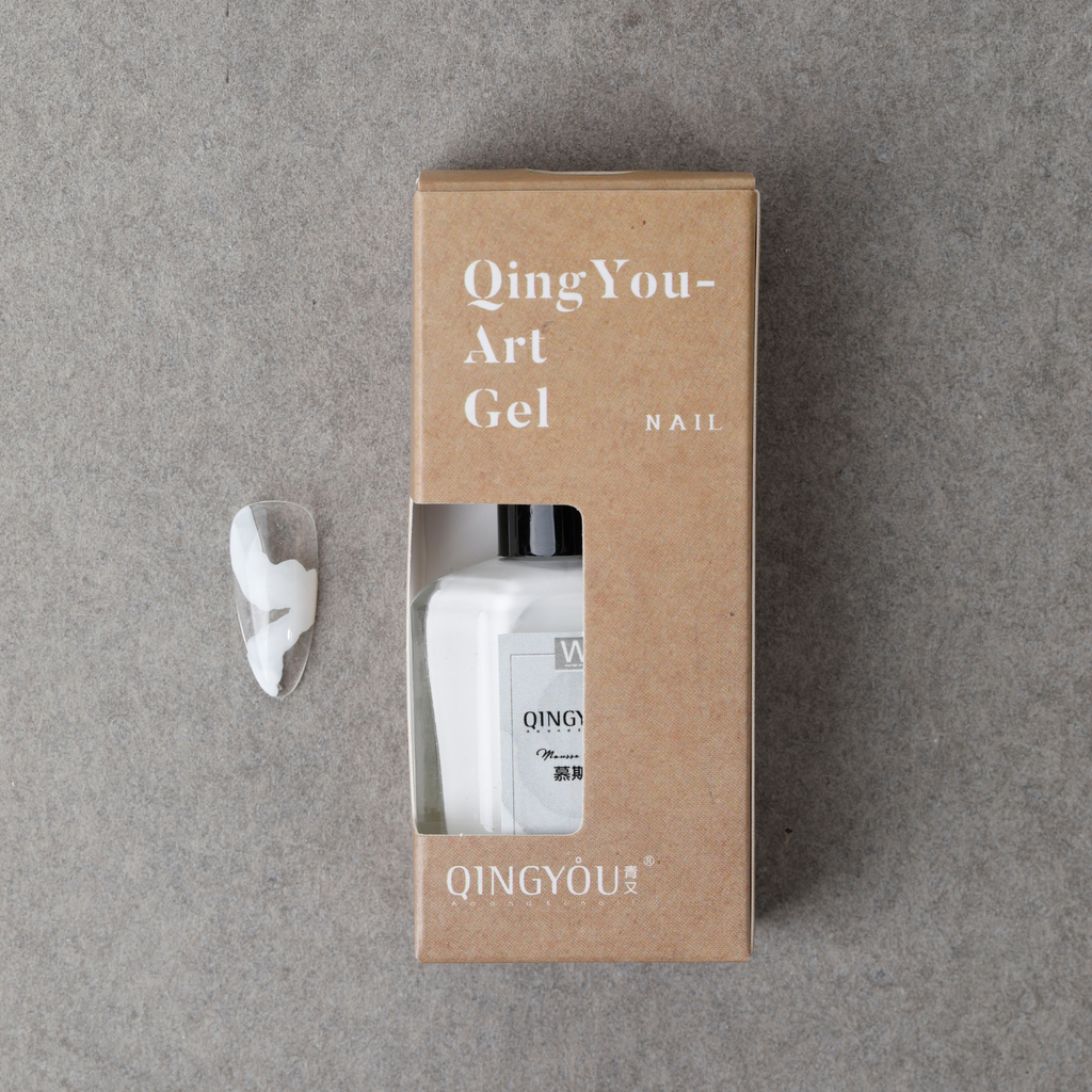 QINGYOU White Blooming Ink shown with packaging and nail sample for marble and watercolor nail art effects
