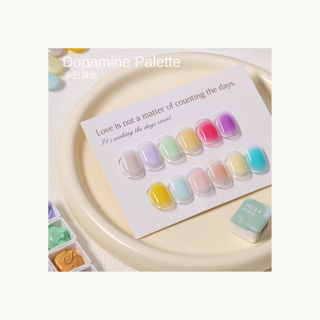 Dopamine Palette pastel bright gel cube colors displayed with nail swatches on a cream plate.