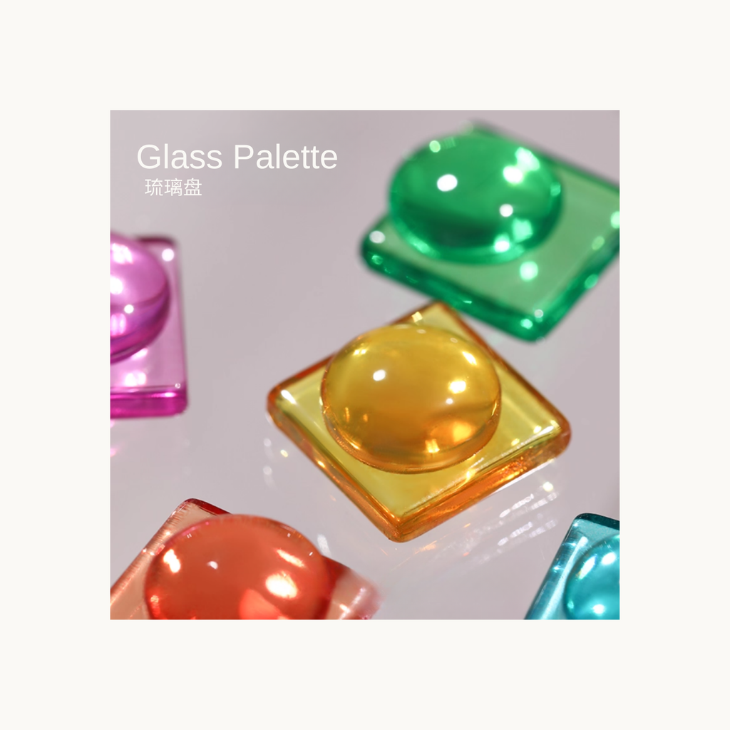 Glass Palette translucent jelly-like gel cubes in vibrant gemstone colors displayed under soft lighting.