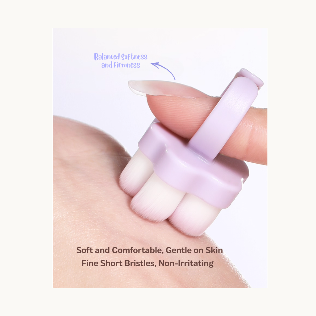 Soft PBT bristles on Meow Paw Brush gently touching the skin for non-irritating use