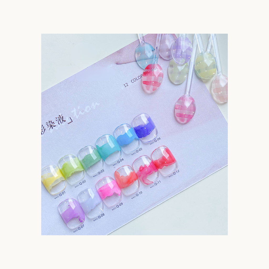 close-up of 12 pastel watercolor nail dye gel swatches with corresponding color powder samples